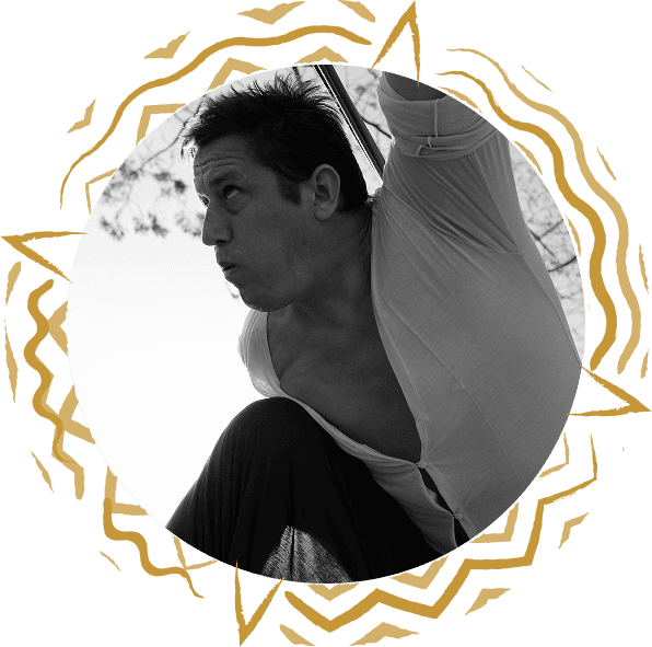 Jonathan Horan dancing in black and white with gold sunburst frame